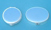 Round and Oval Compact Mirrors with Lids Closed